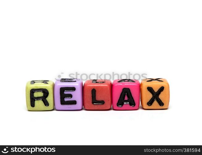 relax - word made from multicolored child toy cubes with letters