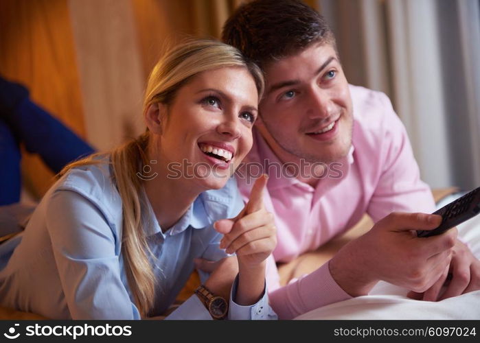 relaxed and happy young couple in modern hotel room