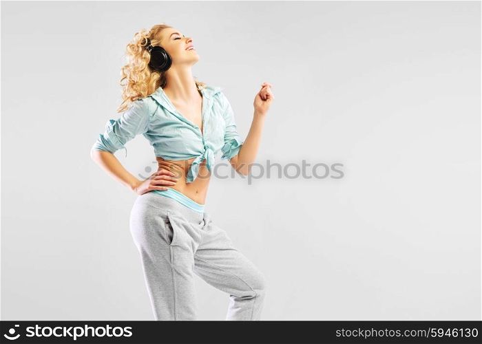 Relaxed blond lady listening to music