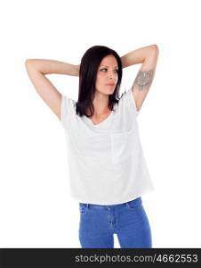 Relaxed brunette woman with a tatto on her arm isolated on a white background