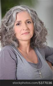 Relaxed gray-haired woman