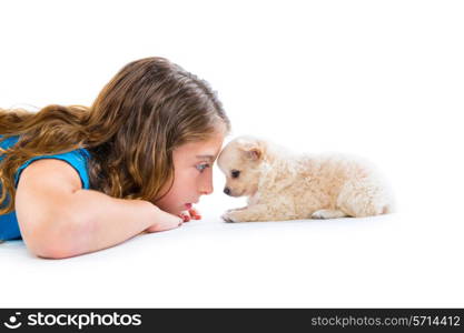 relaxed kid girl and puppy chihuahua dog lying happy profile view on white background