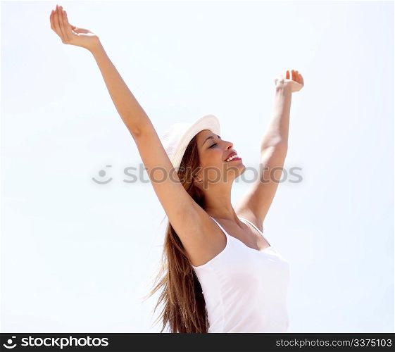 Relaxed woman with arms outstretched