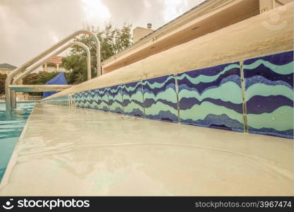 relaxing at the swimming pool