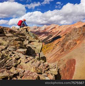 Relaxing backpacker in the mountains.