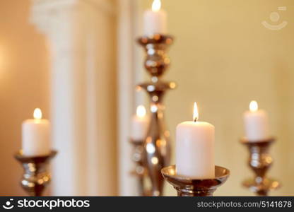 religion concept - candles burning in church. candles burning in church