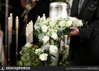 Religion, death and dolor - funeral and cemetery; urn funeral
