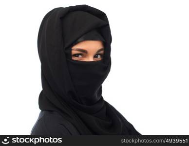 religious and people concept - happy muslim woman in hijab over white background. muslim woman in hijab over white background