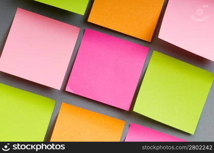 Reminder notes on the bright colorful paper