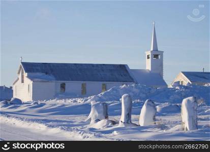 Remote church with steeple after snow storm