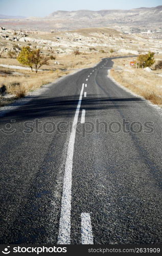 Remote highway through barren area