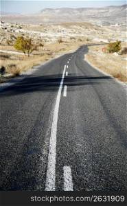 Remote highway through barren area
