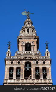 Renaissance style belfry of La Giralda bell tower, part of the Seville Cathedral in Spain, Andalusia region.