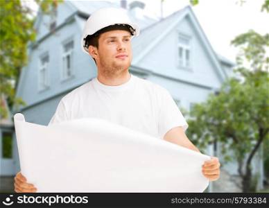 renovation, building, people and home concept - male builder or architect in helmet holding blueprint over living house background