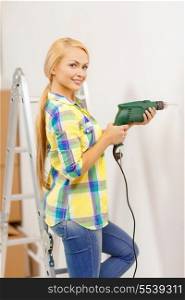 repair, building and home concept - smiling woman with electric drill making hole in wall