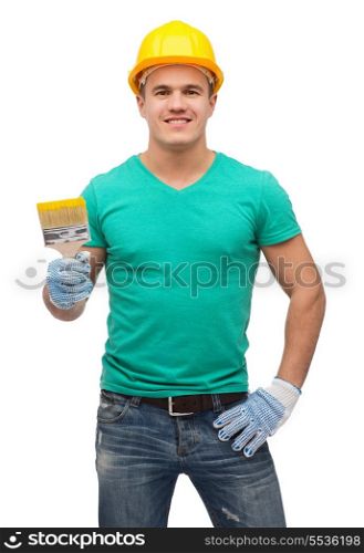 repair, construction and maintenance concept - smiling male manual worker in protective helmet with paintbrush