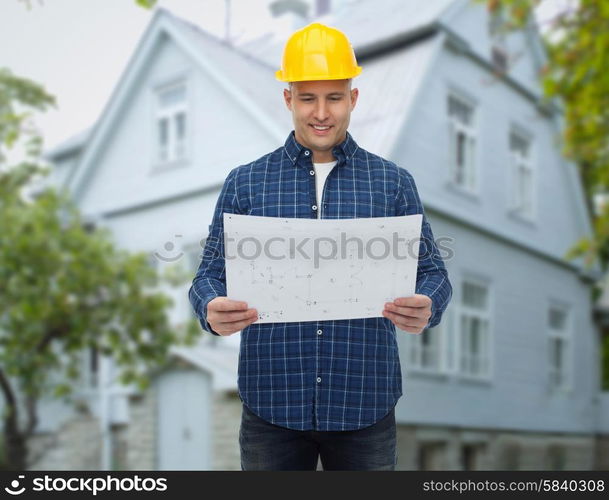 repair, construction, building, people and maintenance concept - smiling male builder or manual worker in helmet with blueprint over living house background