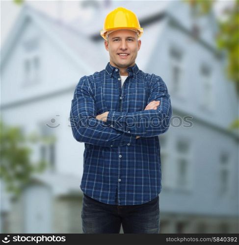 repair, construction, building, people and maintenance concept - smiling male builder or manual worker in helmet over living house background