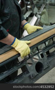 Repairing automotive body. Repairing automotive body closeup photo