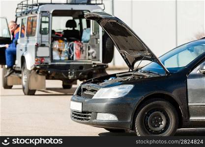 Repairing service man with damaged car trouble problem crash breakdown