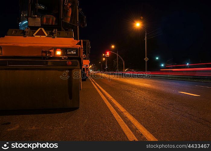 repairing the road. repairing the road in the night city