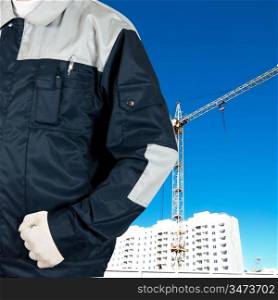 repairman closeup with uniform on building background