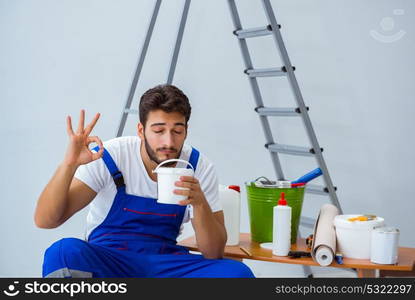 Repairman doing renovation repair in the house with paper wallpa. Repairman doing renovation repair in the house with paper wallpaper