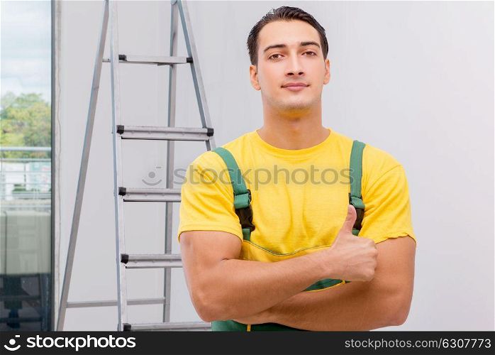Repairman in coveralls in DIY concept