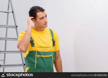 Repairman in coveralls in DIY concept