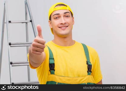 Repairman in coveralls in DIY concept