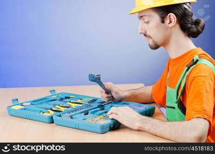 Repairman with his toolkit