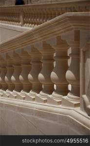 Repetitive shadows and light on a balustrade at citadel Gozo