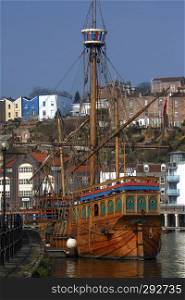 Replica galleon in the Floating Harbor in the city of Bristol in southwest England. Called the Floating Harbor as the water level remains constant and is not affected by the tide.