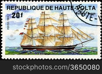 REPUBLIC OF UPPER VOLTA- CIRCA 1984: A stamp printed in Republic of Upper Volta shows the ship &acute;Malden Queen&acute;, series is devoted to sailing vessels, circa 1984