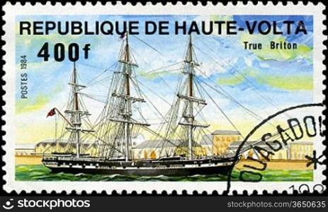 REPUBLIC OF UPPER VOLTA- CIRCA 1984: A stamp printed in Republic of Upper Volta shows the ship &acute;True Briton&acute;, series is devoted to sailing vessels, circa 1984