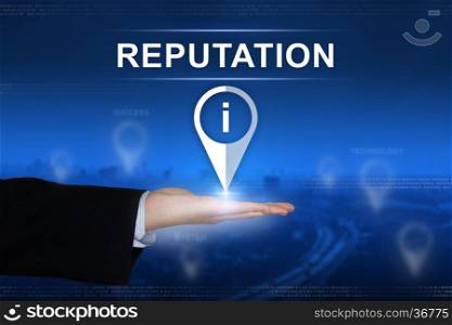 reputation button with business hand on blurred background