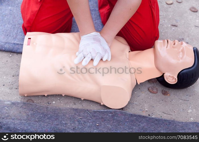 Rescuer practicing heart massage