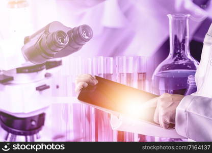 Research and development concept. Double exposure image of scientific and medical lab instrument, microscope, test tube and glass flask for microbiology and chemistry in laboratory for medicine study.