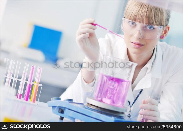 research and science doctor student people in bright labaratory representing chemistry education and medicine concept
