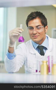 research and science doctor student people in bright laboratory representing chemistry education and medicine concept