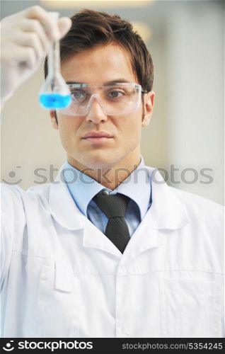 research and science doctor student people in bright laboratory representing chemistry education and medicine concept