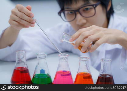 Researcher working with chemical