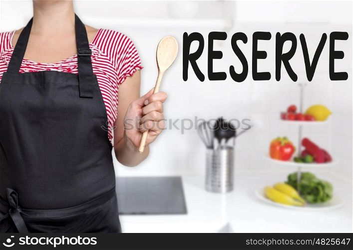 reserve cook holding wooden spoon background concept. reserve cook holding wooden spoon background concept.
