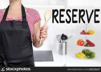 reserve cook holding wooden spoon background concept. reserve cook holding wooden spoon background concept.