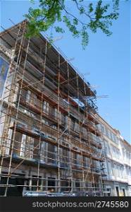 residential building under construction (blue sky background)