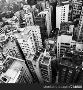 Residential buildings in Hong Kong city from above, China. Black and white image