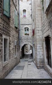 Residential buildings on a narrow street in the Old Town of Split in Croatia, Dalmatia region.