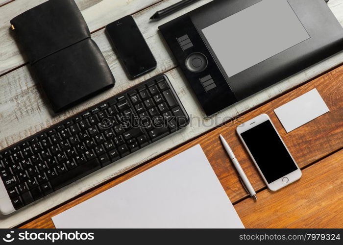 Responsive design mockup. The responsive design mockup on wooden background