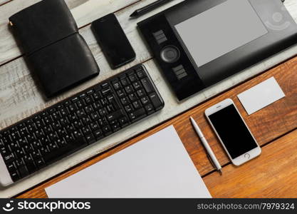 Responsive design mockup. The responsive design mockup on wooden background