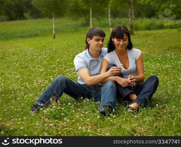 Rest of a happy loving couple in park